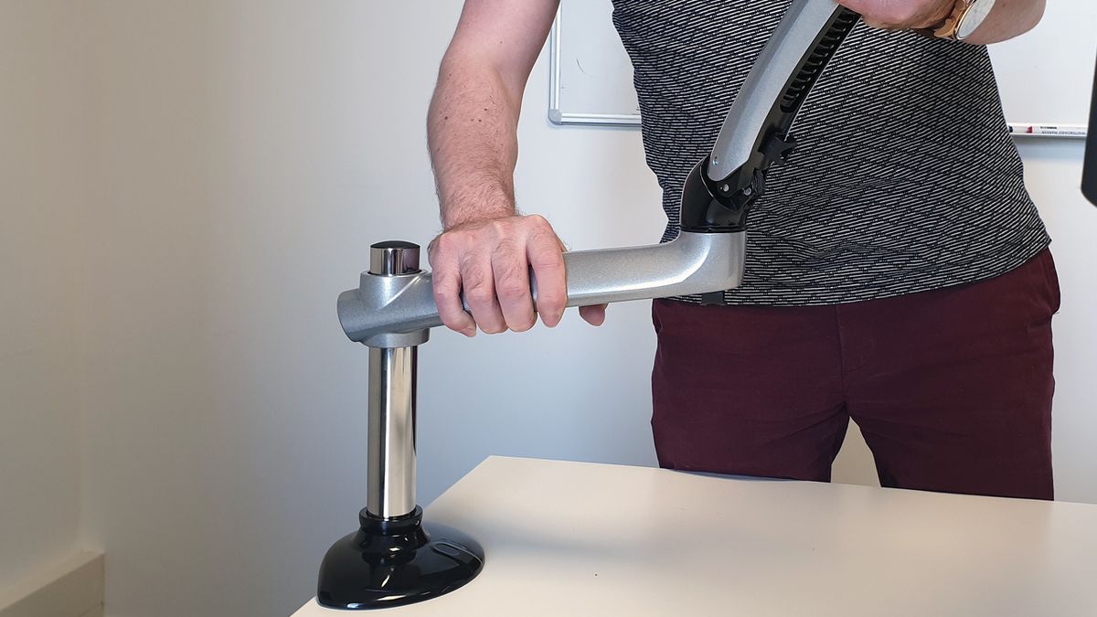 Taking into consideration the combined weight of the monitor and arm, it is easy to attach and the desk clamp pole immediately takes all the weight while you adjust.