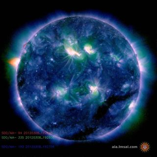 This color-coded image combines observations made by NASA's Solar Dynamics Observatory in several extreme ultraviolet wavelengths, highlighting a bright X-class flare toward the upper left of the sun's disk on March 6, 2012.