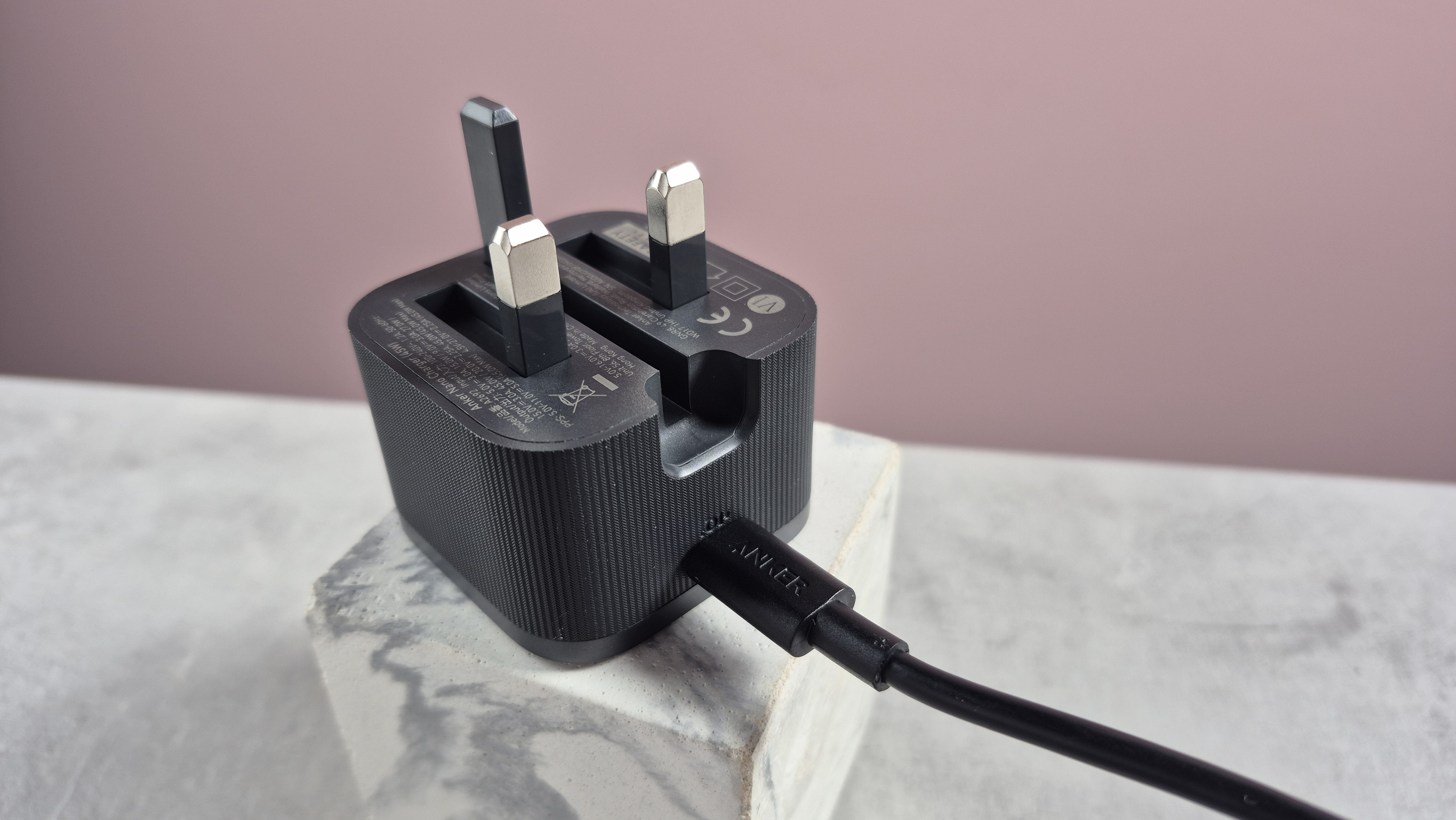 Anker Nano Charger 45W with USB-C Cable with prongs pointing upwards