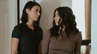 Cruz and Josephina look at each other