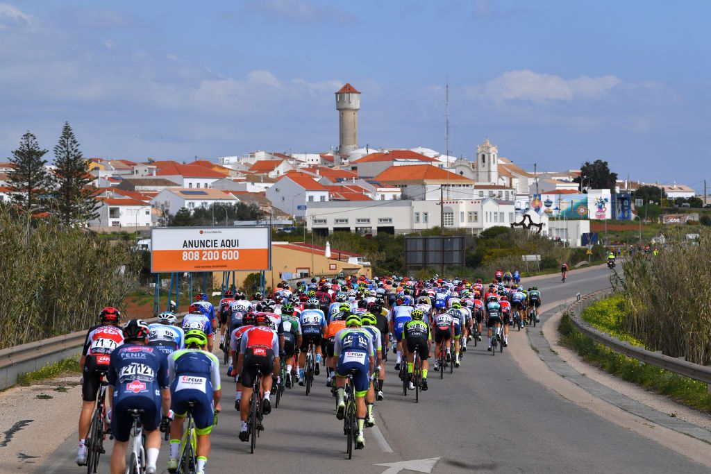 ALTO DA FIA MONCHIQUE PORTUGAL FEBRUARY 20 Start Jonathan Dibben of The United Kingdom and Team Lotto Soudal Otto Vergaerde of Belgium and Team AlpecinFenix Xandro Meurisse of Belgium and Team Circus Wanty Gobert Guillaume Boivin of Canada and Team Israel StartUp Nation Lus Mendona of Portugal and Team Efapel Jan Polanc of Slovenia and UAETeam Emirates Peloton Sagres Village Landscape during the 46th Volta ao Algarve 2020 Stage 2 a 1839 km stage from Sagres Vila do Bispo to Alto da Fia 884m Monchique VAlgarve2020 on February 20 2020 in Alto da Fia Monchique Portugal Photo by Tim de WaeleGetty Images