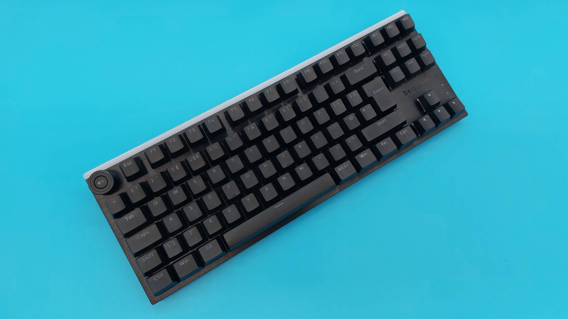 The Be Quiet Light Mount TKL wired mechanical gaming keyboard seen from various angles.
