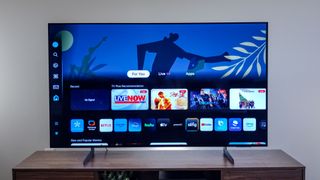 Samsung S85D OLED TV on stand in living room