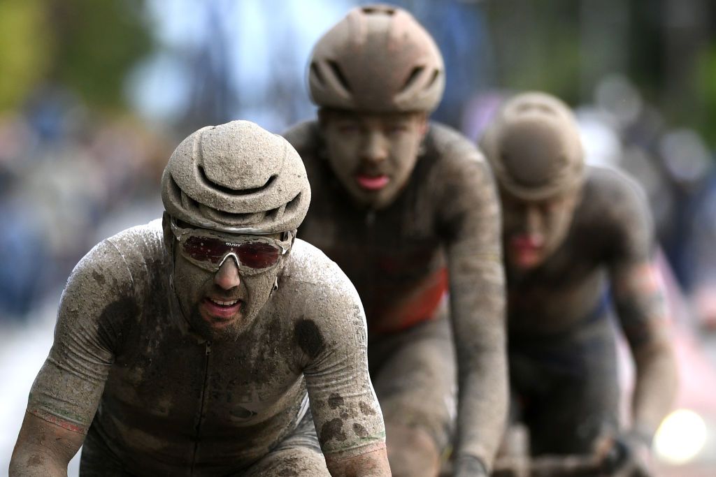 ROUBAIX FRANCE OCTOBER 03 Sonny Colbrelli of Italy and Team Bahrain Victorious covered in mud competes in the breakaway during the 118th ParisRoubaix 2021 Mens Eilte a 2577km race from Compigne to Roubaix ParisRoubaix on October 03 2021 in Roubaix France Photo by Tim de WaeleGetty Images