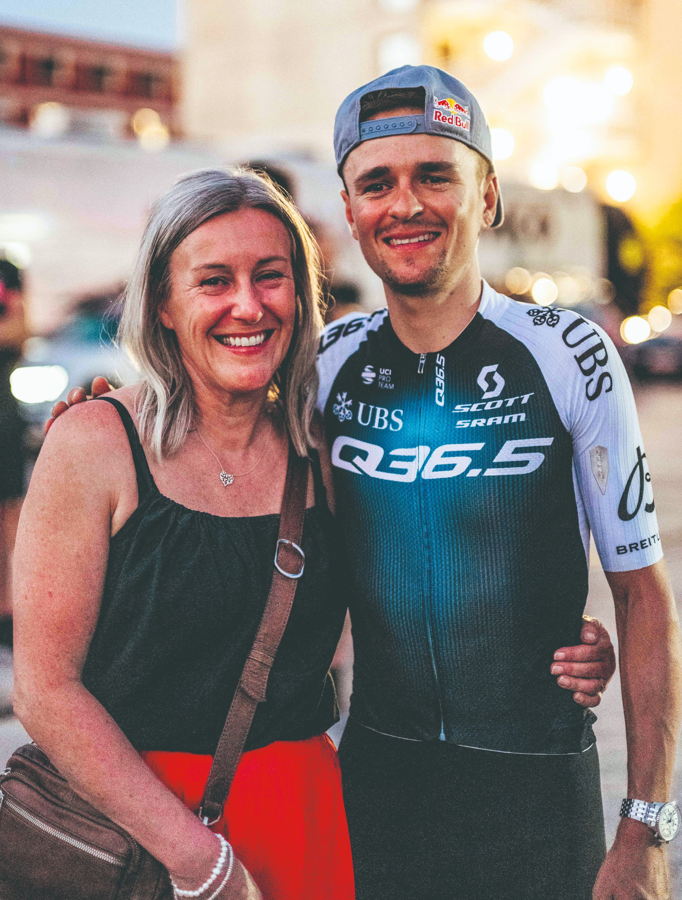 Tom Pidcock standing with his mum