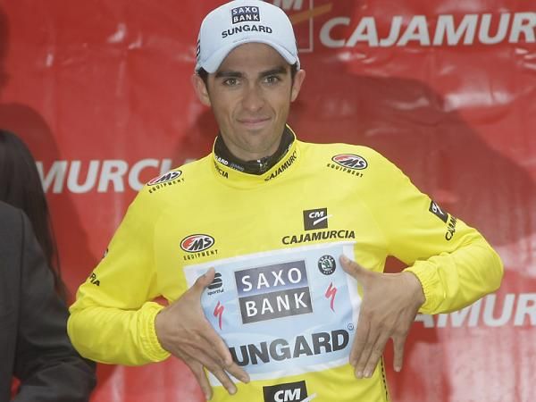 Alberto Contador emphasizes his new team, Saxo Bank Sungard, on the podium in Murcia