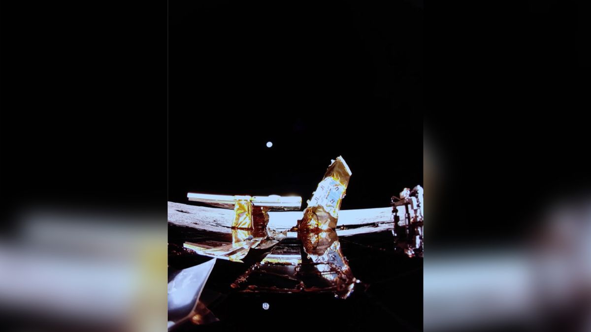 Blue Ghost lander on the surface of the moon with a pale blue dot - Earth - in the background