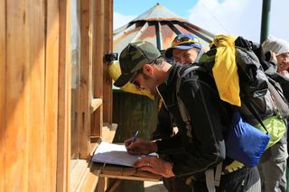 Ivan Basso signs in at camp