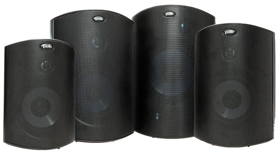  four black speakers on a white background