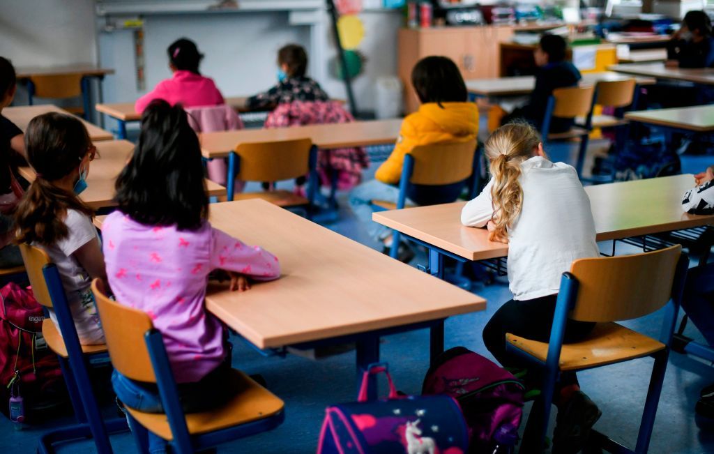 Students sit in a classroom of the Petri primary school in Dortmund, western Germany.