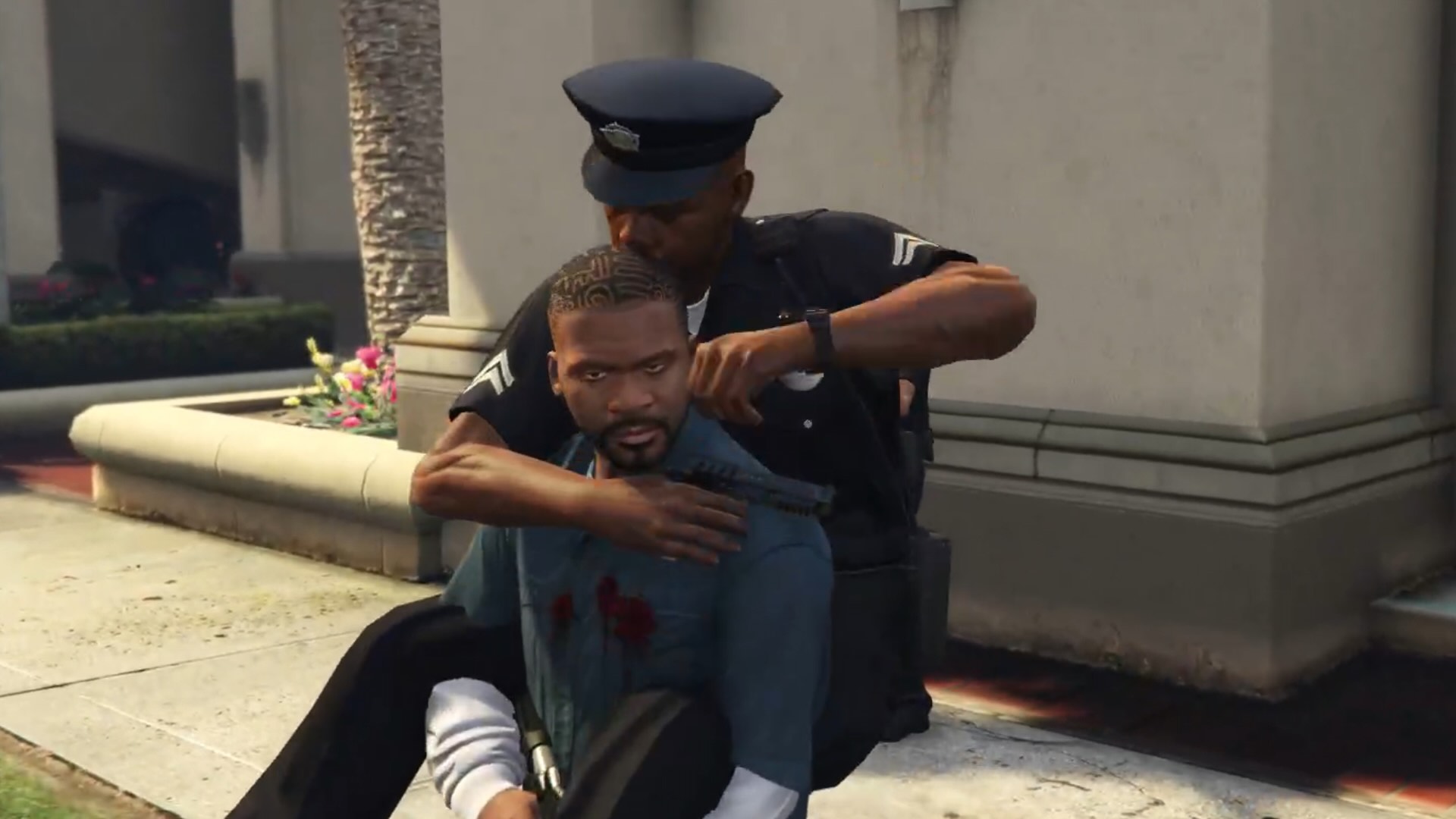 Franklin gives a cop a piggyback ride and looks unimpressed.