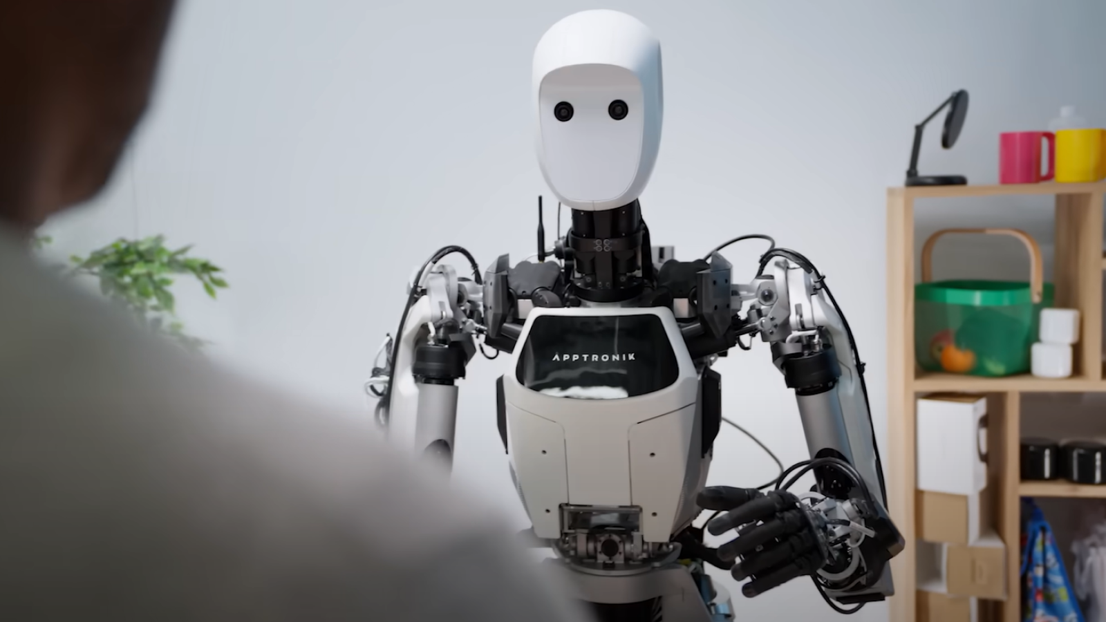 Screenshot of a robot from Google DeepMind performing multiple tasks at once.