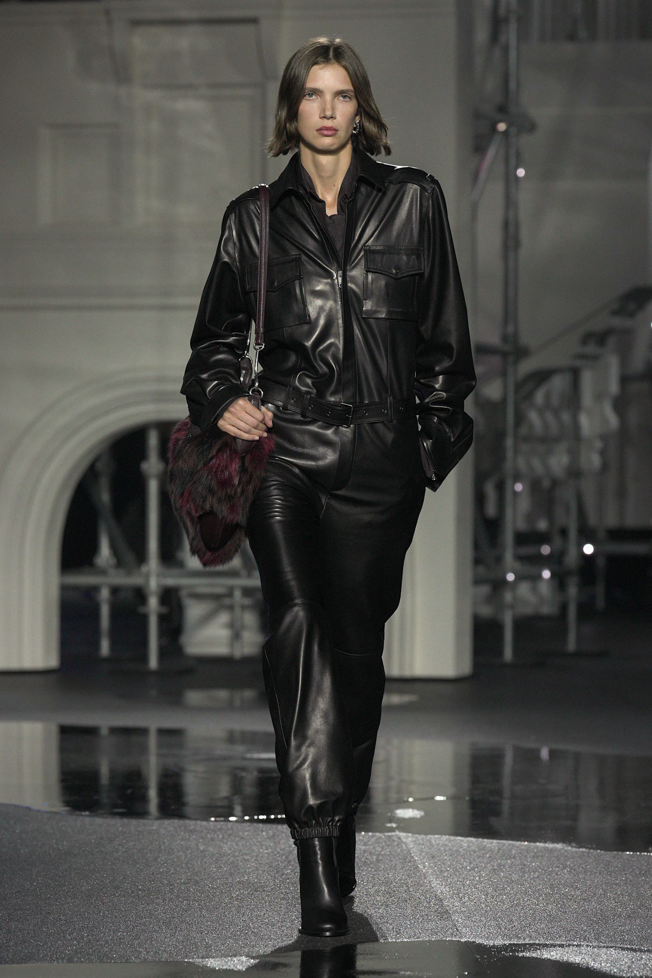 a model walks the burberry winter 2026 show.