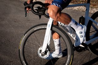 Mathieu van der Poel riding on a sunny dry road