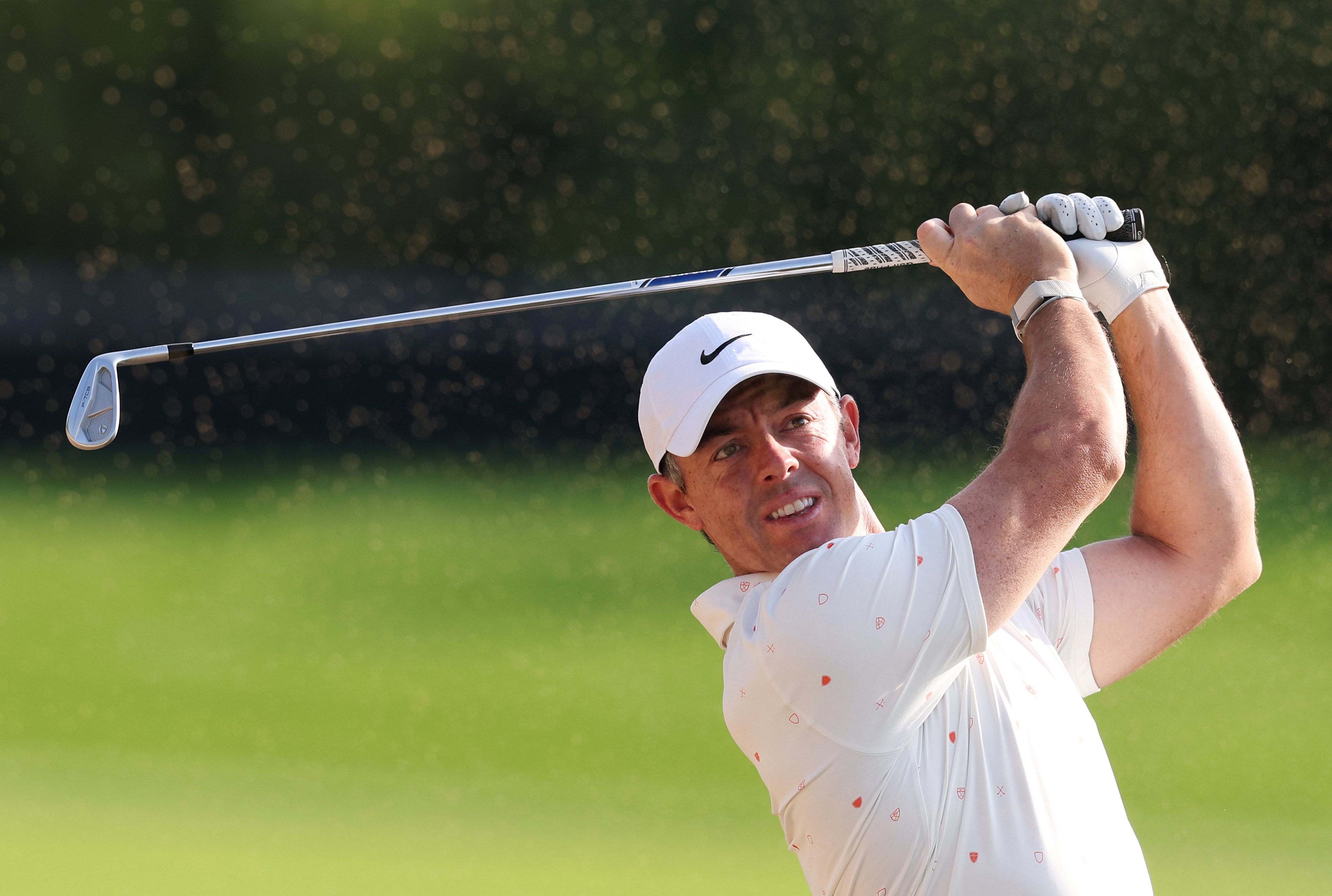 Rory McIlroy hits an iron into the green