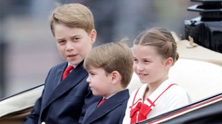Prince George of Wales, Prince Louis of Wales and Princess Charlotte of Wales are seen during Trooping the Colour