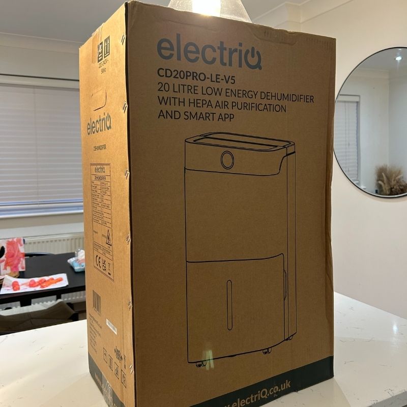 ElectricQ dehumidifier in box on kitchen island