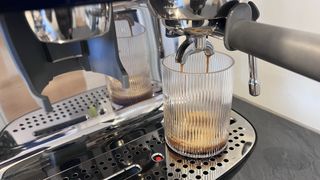 Espresso machine pouring espresso shot