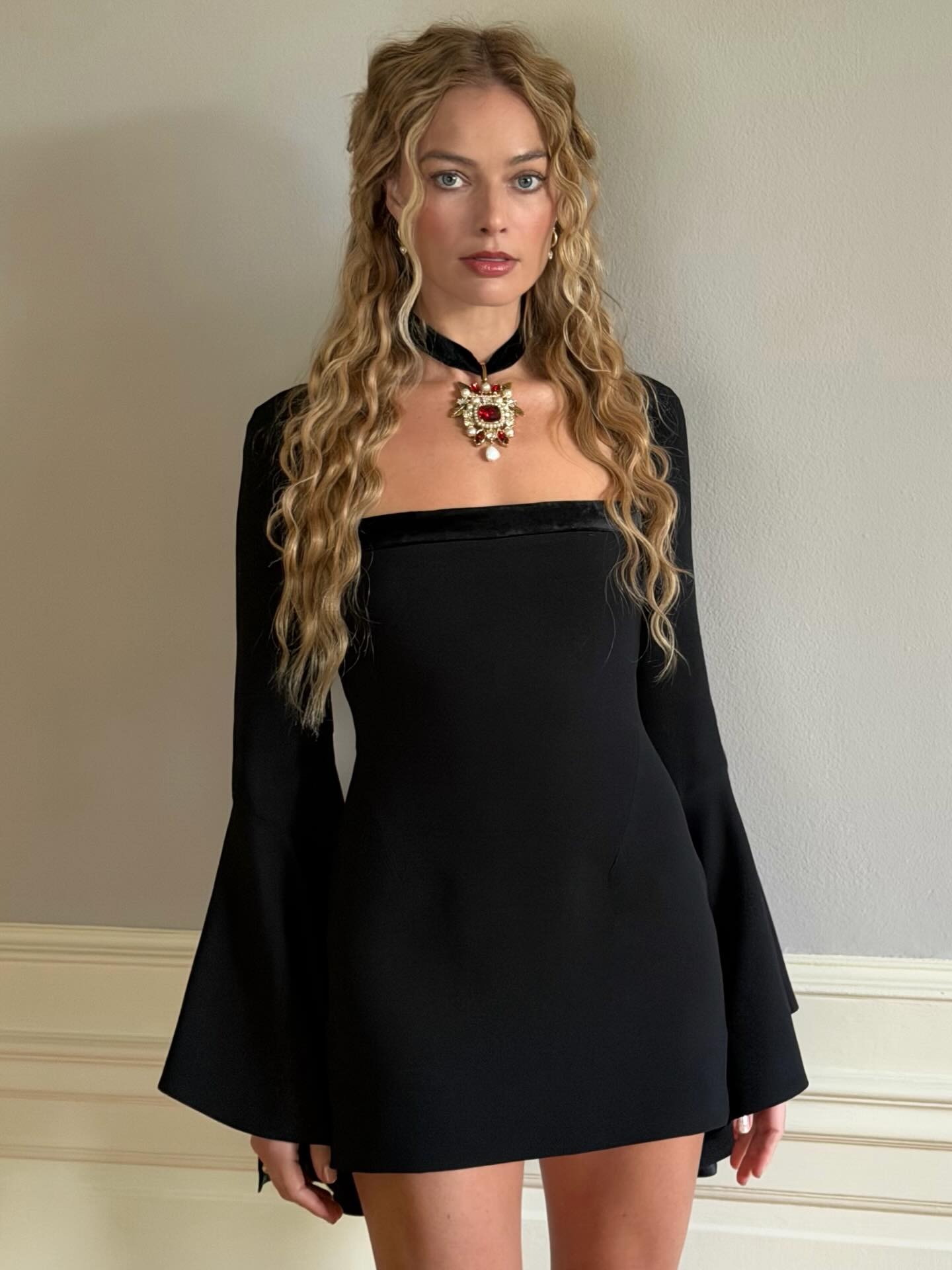 Margot Robbie with mermaid waves