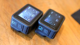 A photo of the GoPro Hero 10 Black and Hero 11 Black side by side