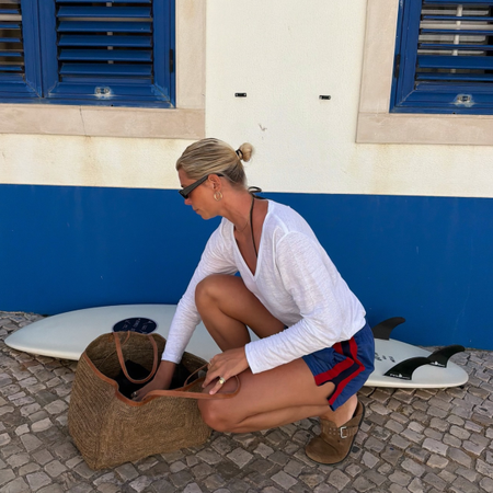 An image of a woman wearing best shoes with sporty shorts