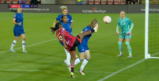 Melvine Malard kicks Niamh Charles in the face