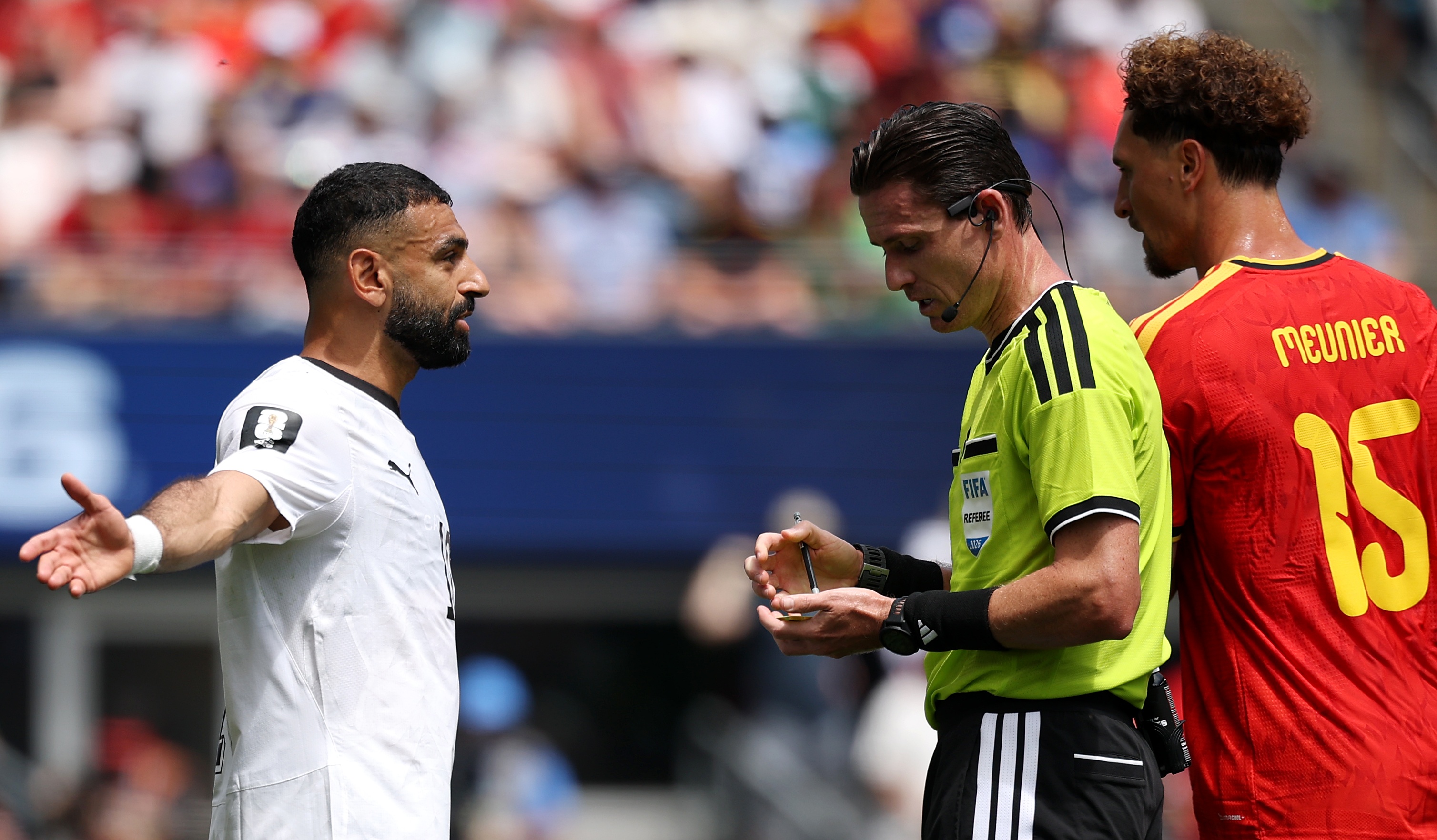 Mohamed Salah #10 of Egypt speaks with referee Ramon Abatti during the FIFA World Cup 2026 Group G match between Belgium and Egypt at Seattle Stadium on June 15, 2026 in Seattle, Washington