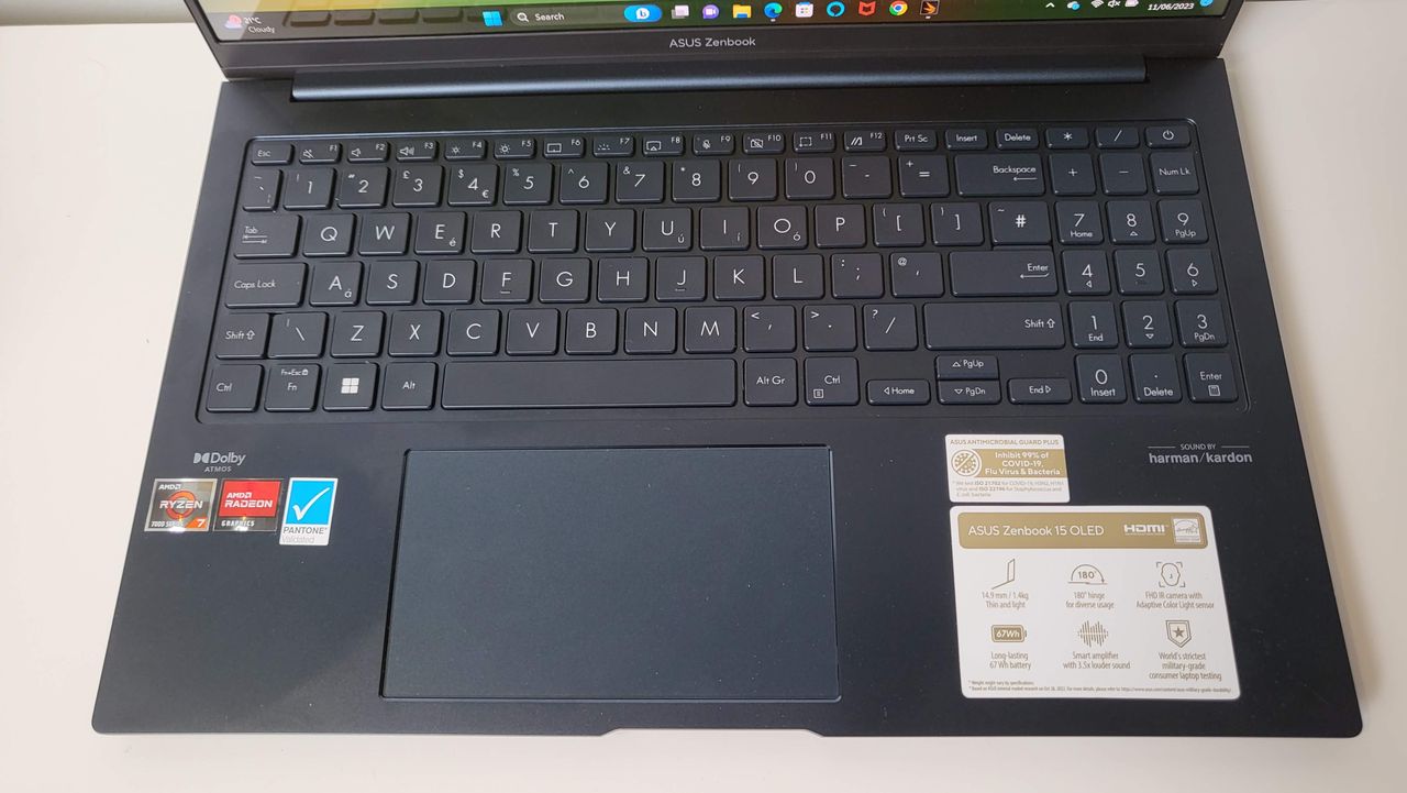 Asus Zenbook OLED 15 (2023) on a shelf