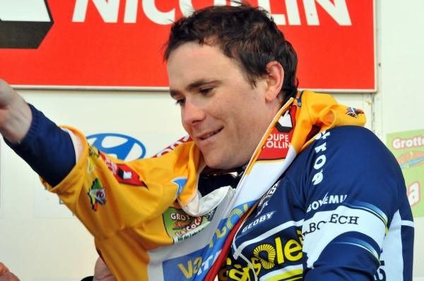 Borut Bozic (Vacansoleil) slips on yet another jersey