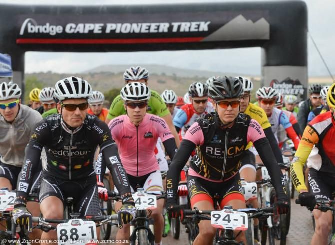 Women&rsquo;s category leaders (in pink) Team RE:CM&rsquo;s Anneka Langvad (left) and Ariane Kleinhans set off to start Stage 1