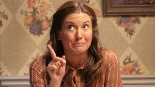 Mary points up to the sky