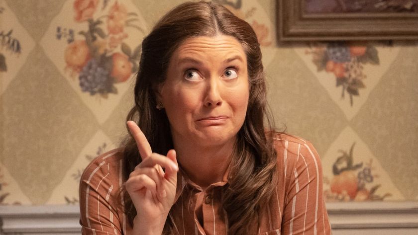 Mary points up to the sky 