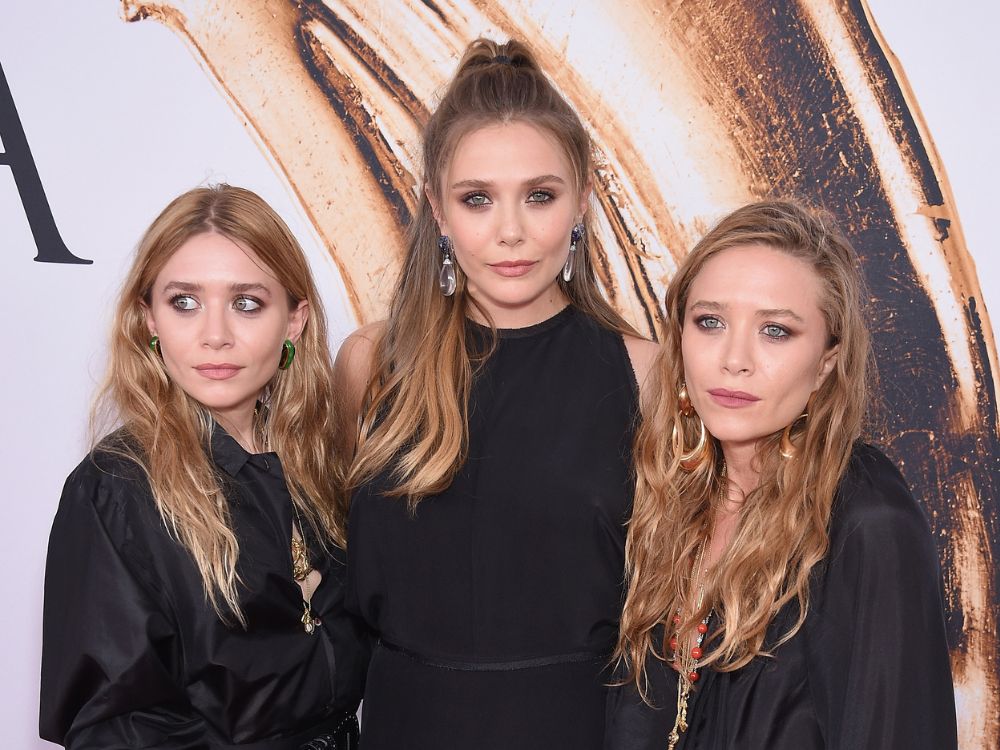 Mary-Kate, Ashley and Elizabeth Olsen attend the 2016 CDFA Fashion Awards
