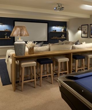 living room lighting scheme with accent lighting and blue pool table