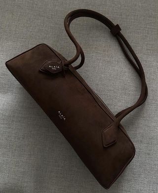 A brown suede bag.