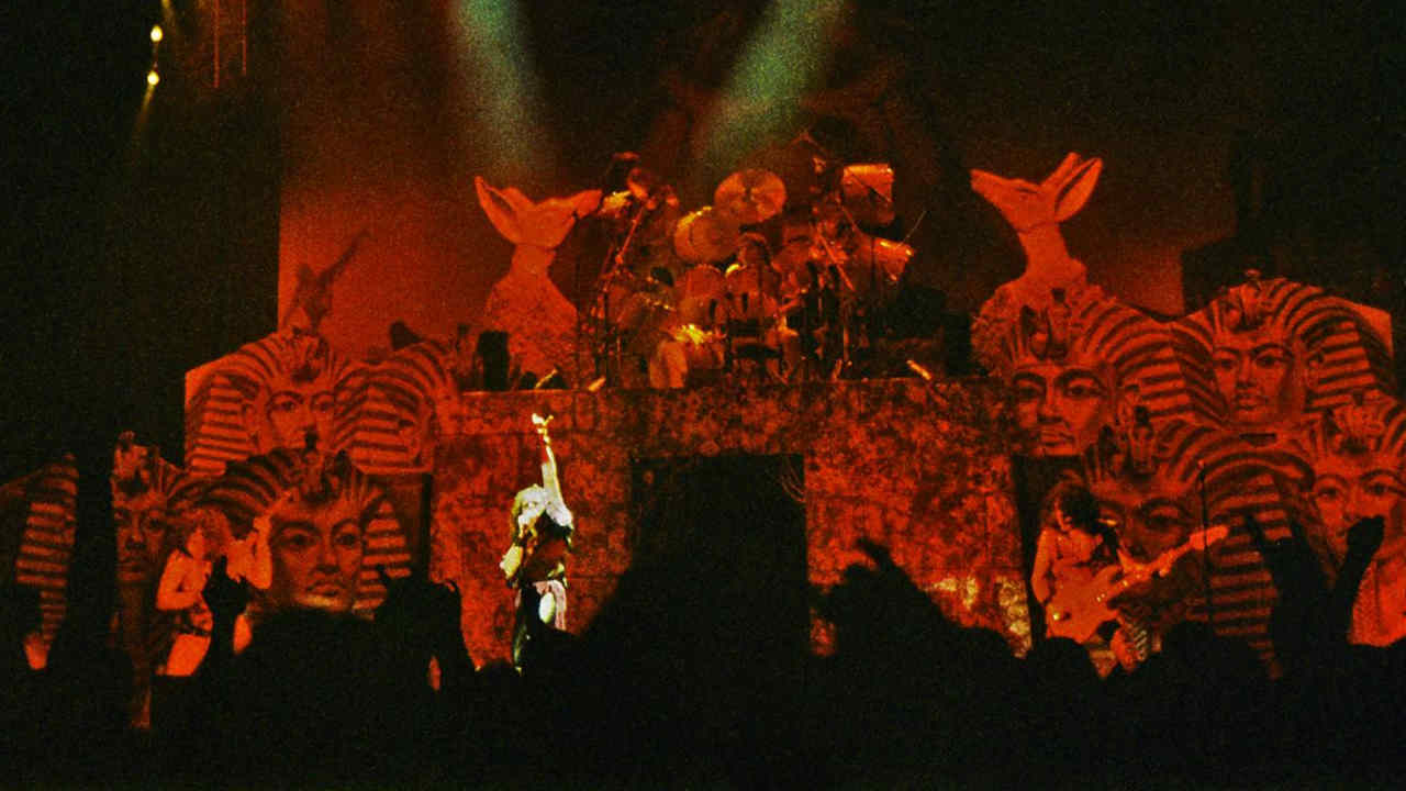 Dio performing onstage in the 1980s