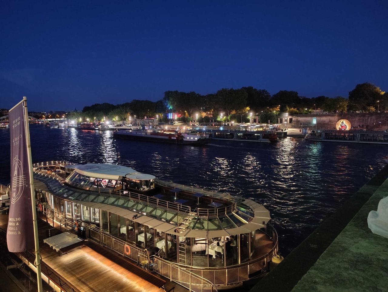 A boat in a river at night