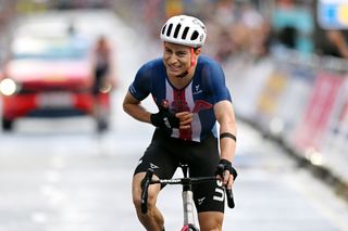 Neilson Powless of The United States crosses the finish line during the 96th UCI Cycling World Championships Glasgow 2023 Men Elite Road Race