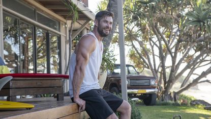Chris Hemsworth relaxing outside