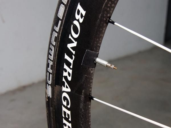 A bit of tape keeps the extra-long valve stem from rattling.