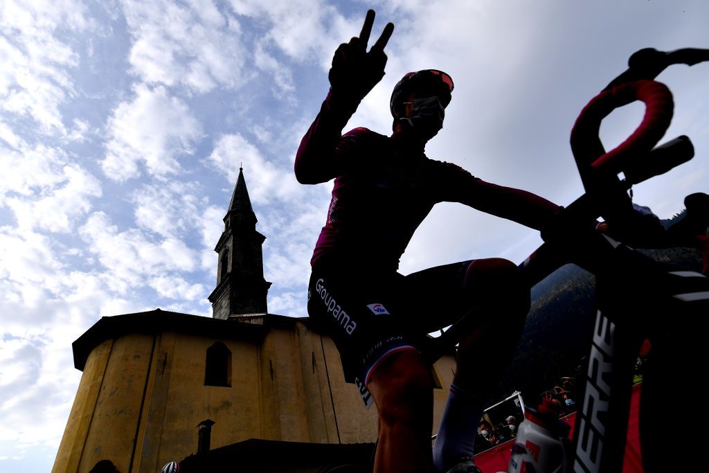 LAGHI DI CANCANO ITALY OCTOBER 22 Start Arnaud Demare of France and Team Groupama FDJ Purple Points Jersey Piazza San Giacomo Pinzolo City Mask Covid safety measures Team Presentation Silhouette during the 103rd Giro dItalia 2020 Stage 18 a 207km stage from Pinzolo to Laghi di Cancano Parco Nazionale dello Stelvio 1945m girodiitalia Giro on October 22 2020 in Laghi di Cancano Italy Photo by Stuart FranklinGetty Images