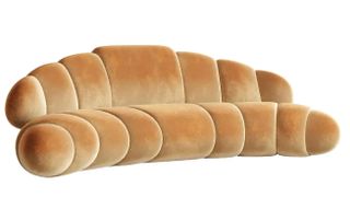 a sofa shaped like a croissant