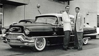 Sam Phillips presents Carl Perkins with a Cadillac outside Sun Studios
