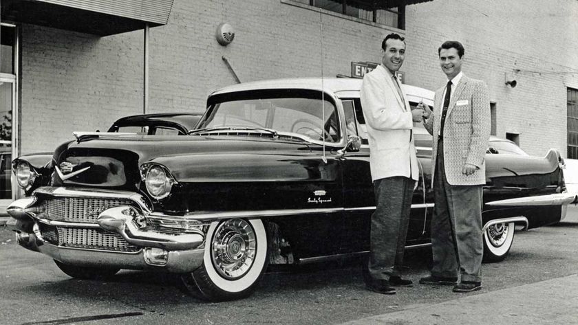 Sam Phillips presents Carl Perkins with a Cadillac outside Sun Studios