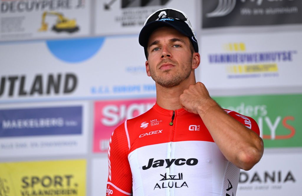 LICHTERVELDE, BELGIUM - SEPTEMBER 25: Dylan Groenewegen of The Netherlands and Team Jayco AlUla on second place poses on the podium ceremony after the 77th Omloop van het Houtland 2024 a 195.2km one day race from Eernegem to Lichtervelde on September 25, 2024 in Lichtervelde, Belgium. (Photo by Luc Claessen/Getty Images)