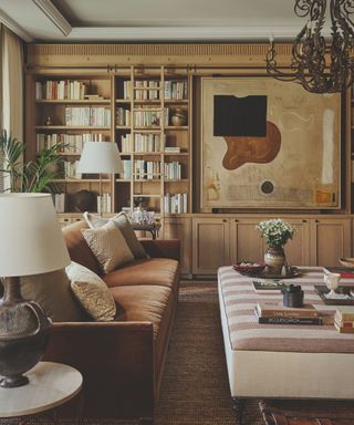 living room in neutral colour palette with wooden shelves