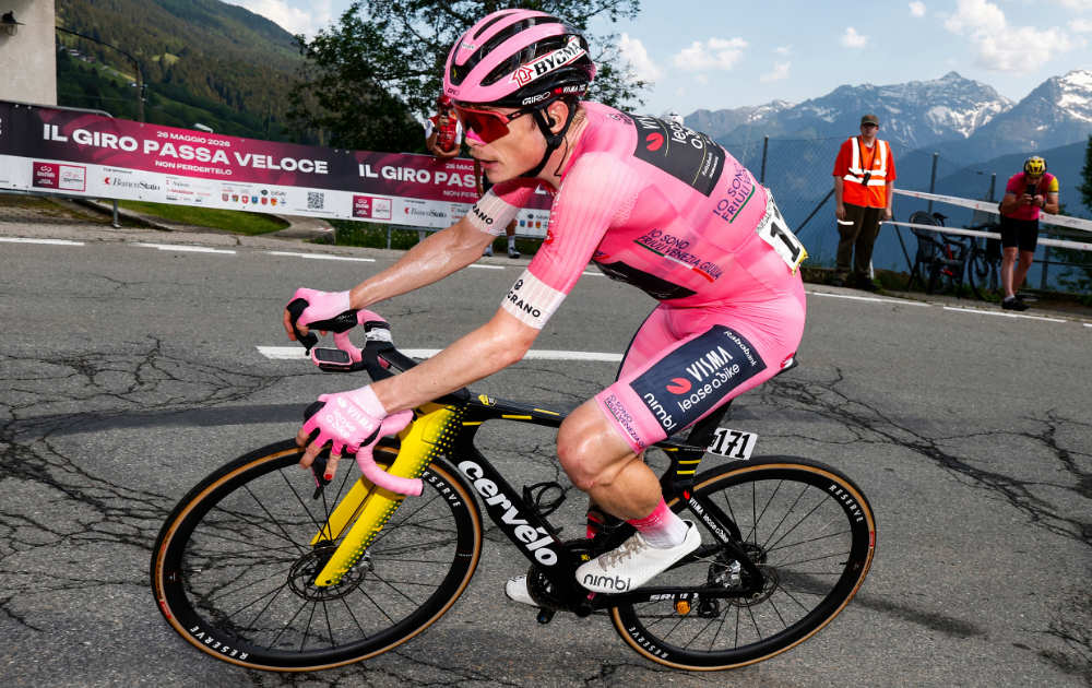 Team Visma Lease a Bike Danish rider Jonas Vingegaard wearing the overall leader's pink jersey (Maglia Rosa) attacks in the final climb during the 16th stage of the Giro d'Italia 2026 