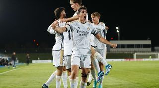 Real Madrid Castilla players celebrate a goal in December 2023.