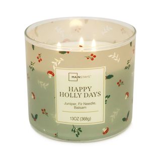 holiday scented candle in green jar