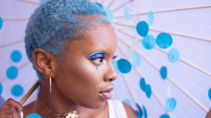 woman with cropped 4C blue hair